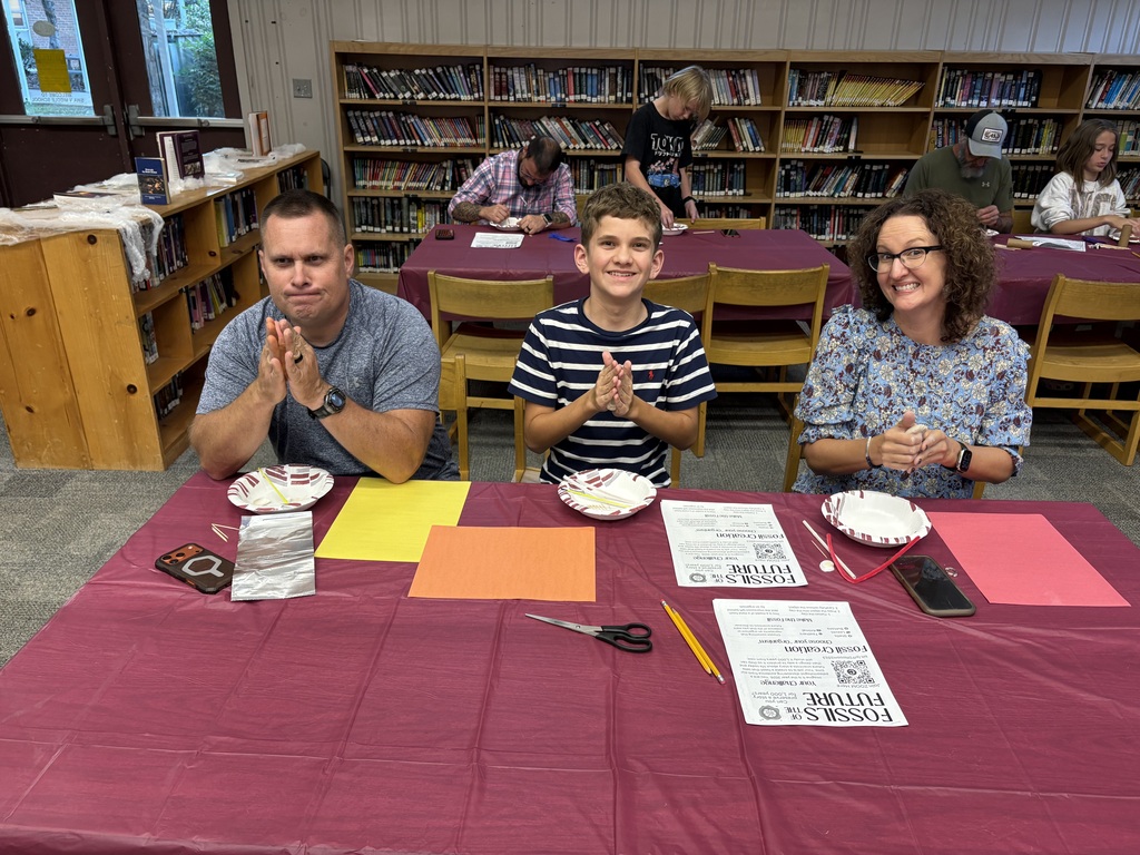 Families and staff participate in dinner and learning activities during October Parent Night at Swain Middle School.