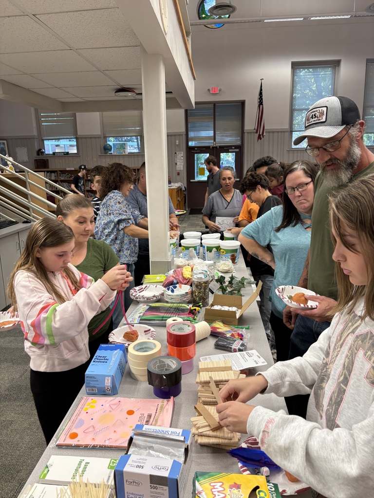 Families and staff participate in dinner and learning activities during October Parent Night at Swain Middle School.