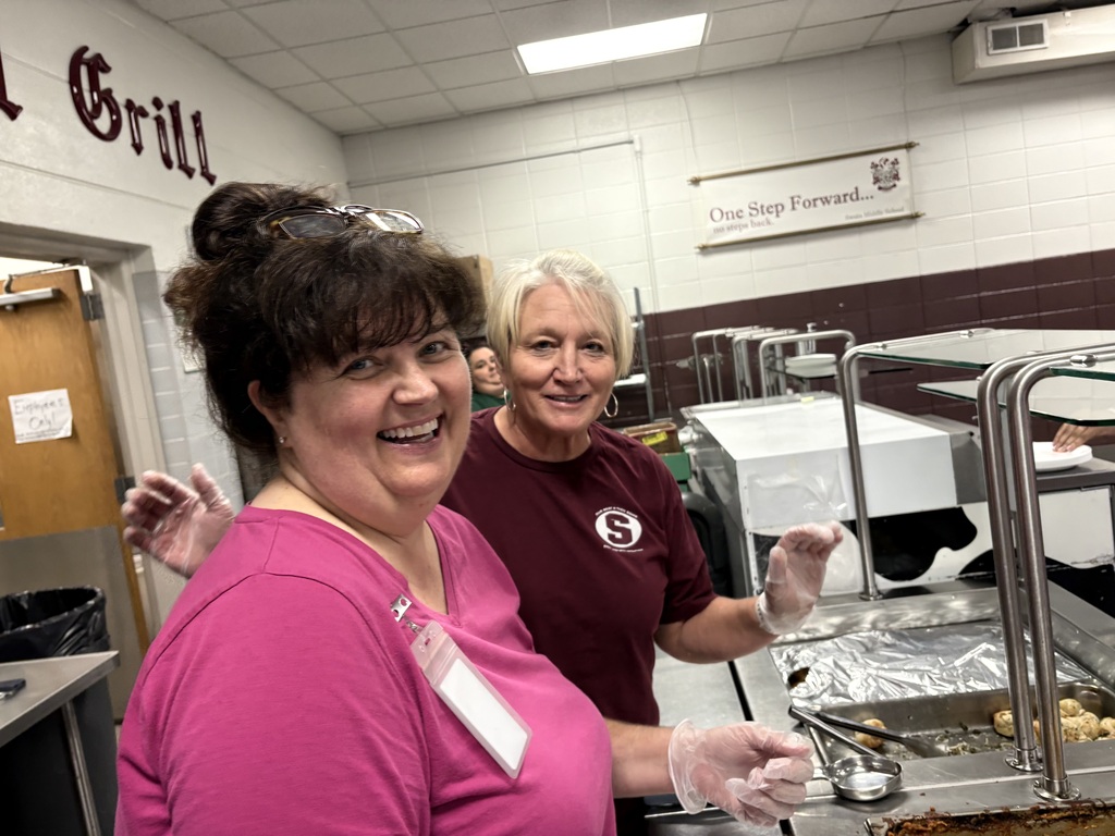 Families and staff participate in dinner and learning activities during October Parent Night at Swain Middle School.