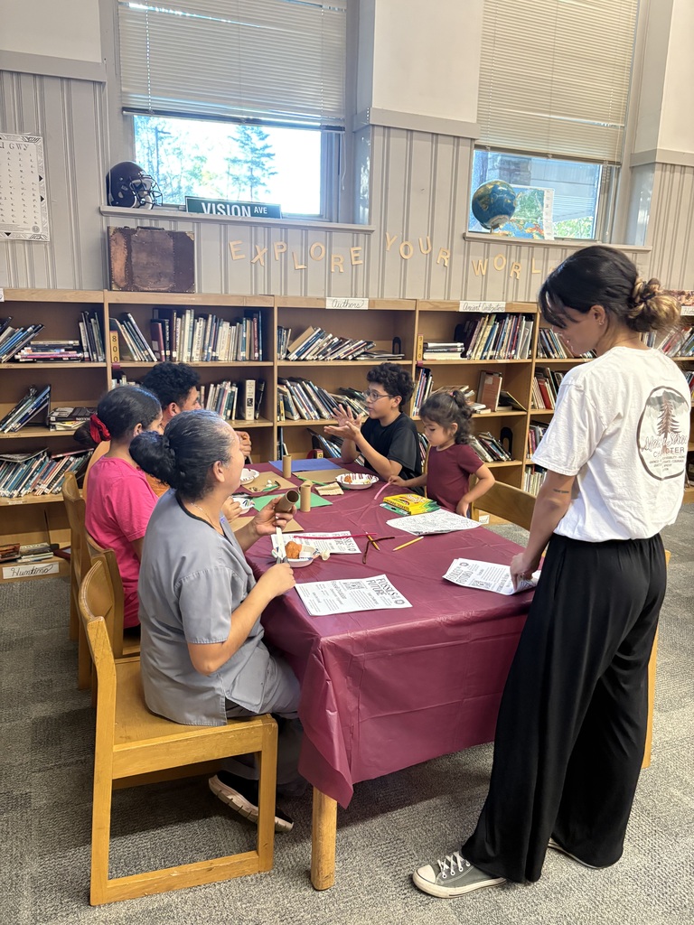 Families and staff participate in dinner and learning activities during October Parent Night at Swain Middle School.