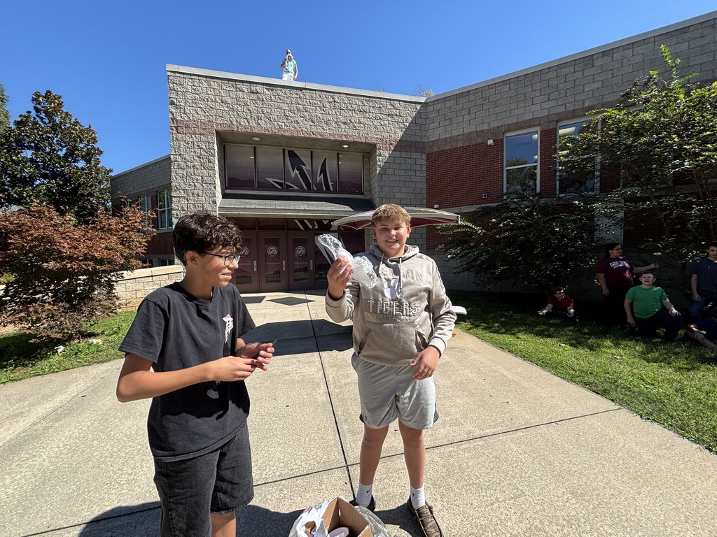 Students in Mr. Cook’s Advanced Technology, Engineering, and Design class participate in an egg drop challenge, testing designs to protect eggs during a fall.