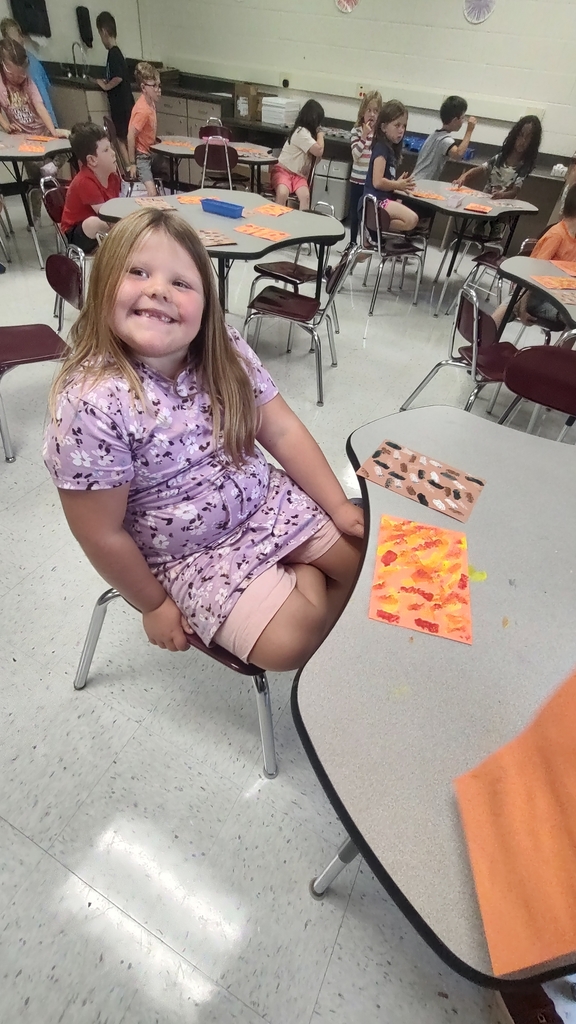 student with artwork