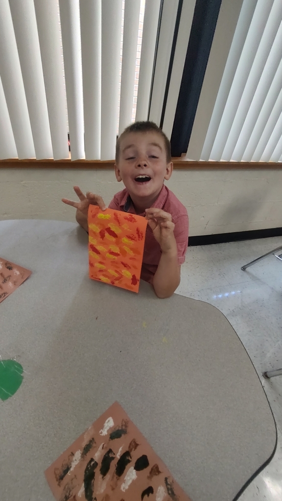 student with art work