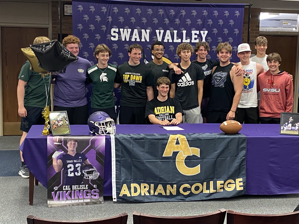 Cal DeLisle and Teammates