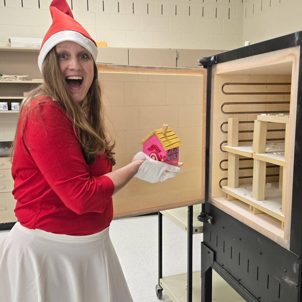 Ali using the new kiln