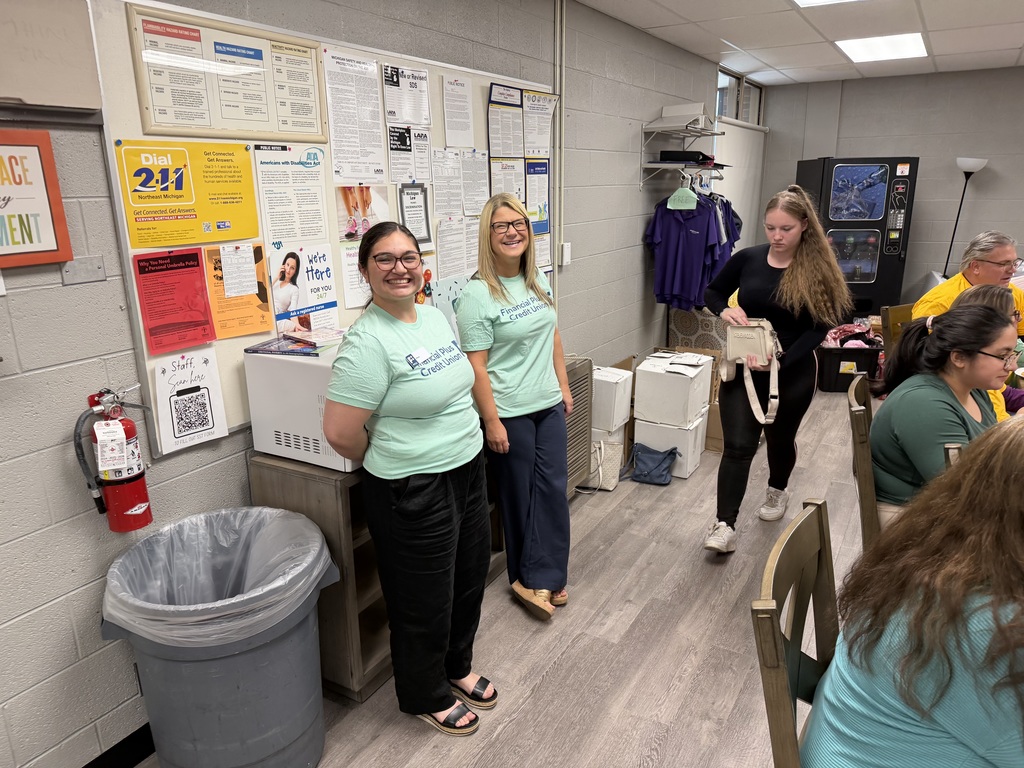 Members of Financial Plus Credit Union helping out with Dirty Sodas and Dirty popcorn in the staff lounge.