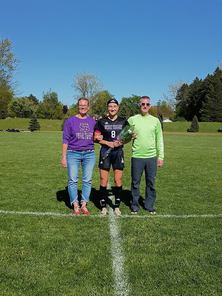 Kinsey Kaul and parents 