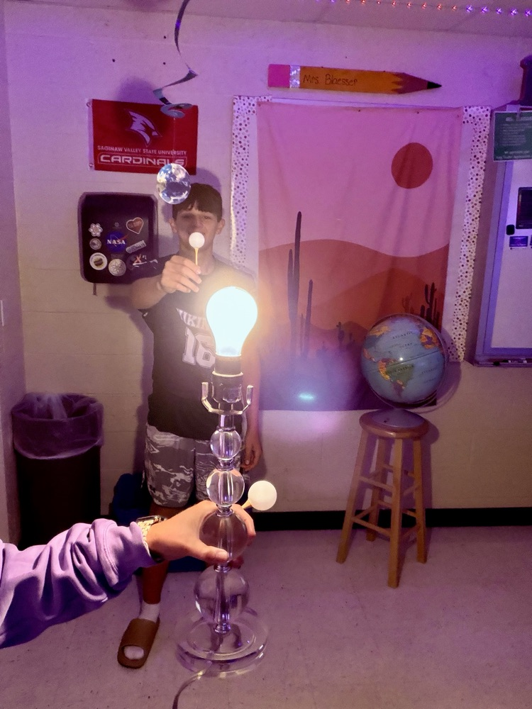 8th students having fun with the Moon Phases in Mrs. Blaesser's class.