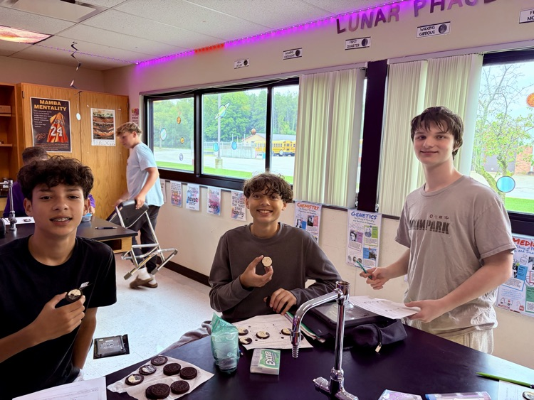 8th students having fun with the Oreo Eclipse project in Mrs. Blaesser's class.