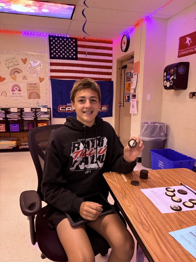 8th students having fun with the Oreo Eclipse project in Mrs. Blaesser's class.