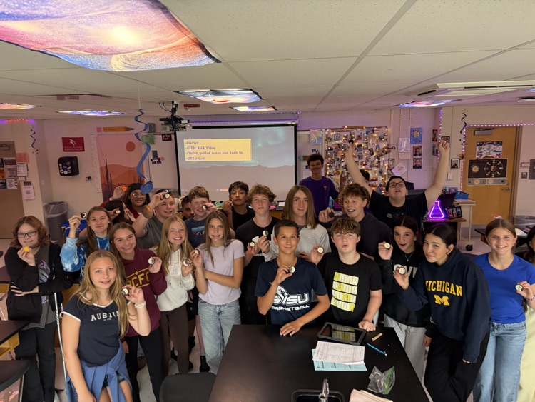 8th students having fun with the Oreo Eclipse project in Mrs. Blaesser's class.