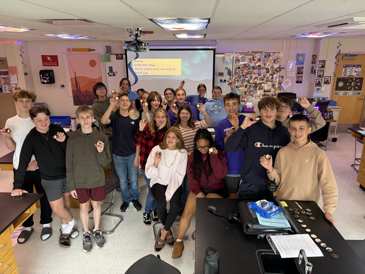 8th students having fun with the Oreo Eclipse project in Mrs. Blaesser's class.