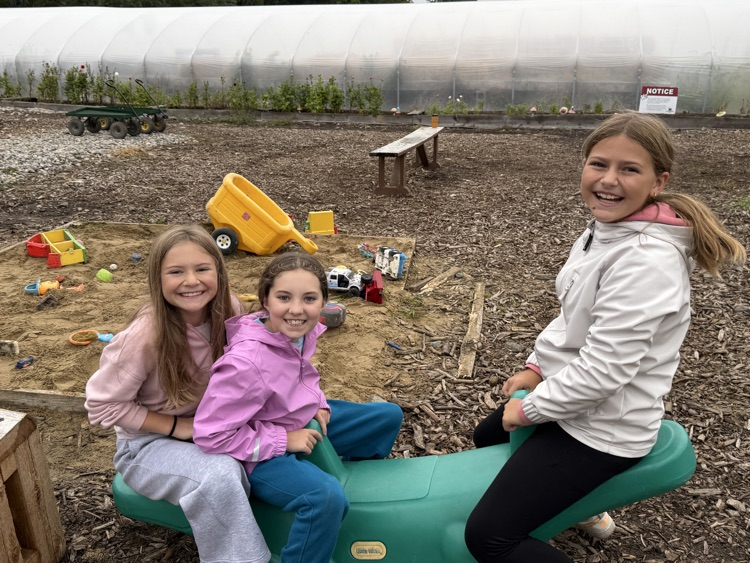 Three Havens students having fun at the play area of Schomaker farms.
