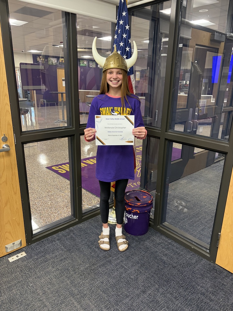 McKenzie Christopher receiving the Viking Athlete of the Week Award for 7th Grade Girls Basketball