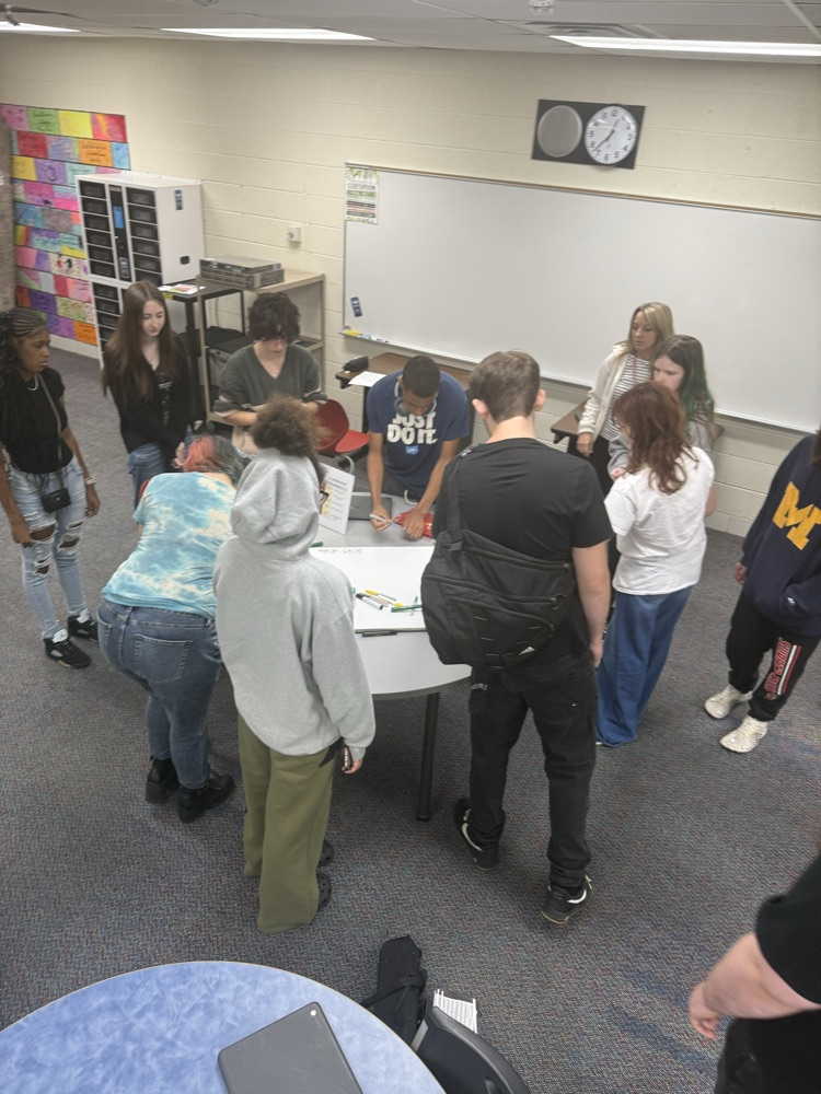 We signed a ceiling tile with the word “persevere”!