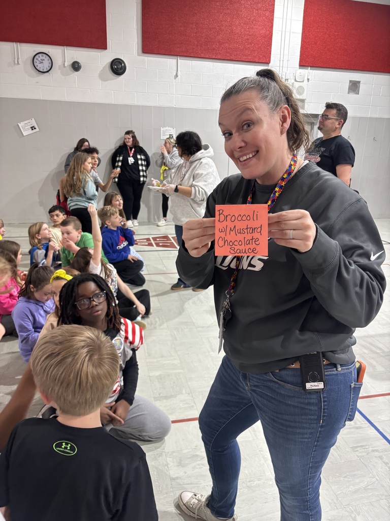 Miss Kenna showing  our third graders the courses for Mr. West