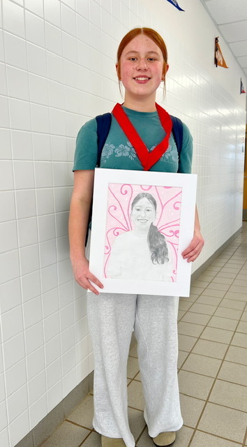 Charlie Garcia with her self portrait