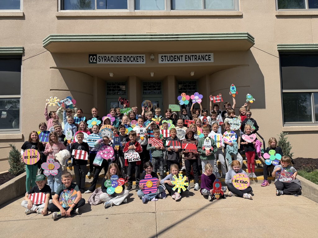 kindness squad with our signs