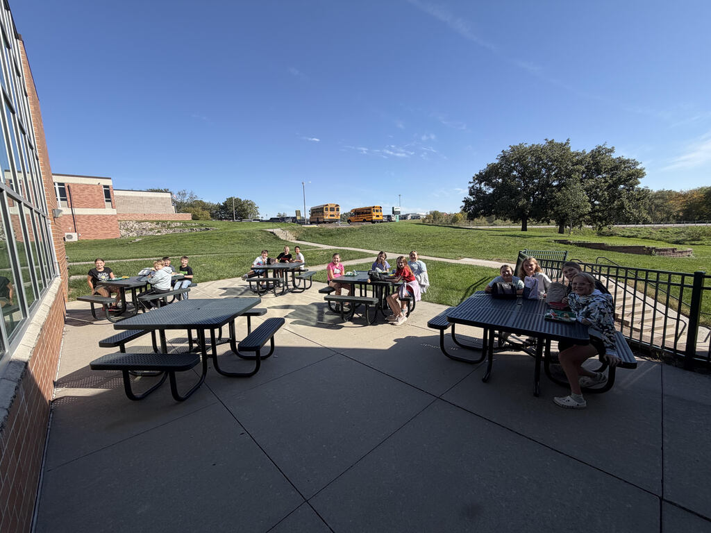 children eating on patio