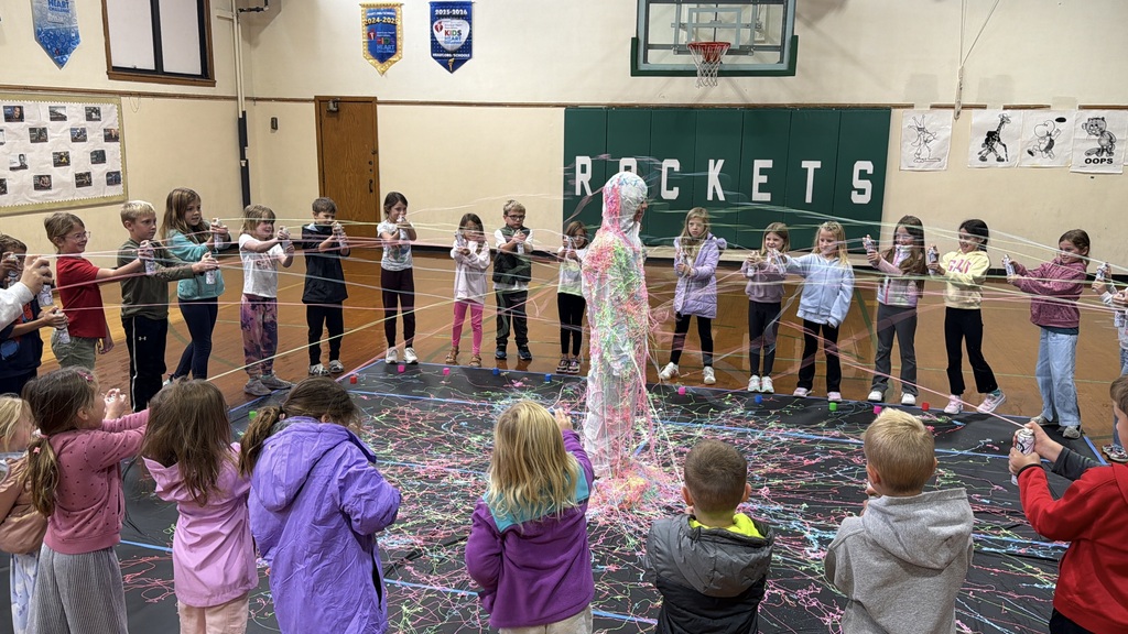 students silly stringing Mrs. Gilkey