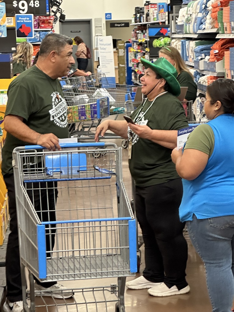 Coach Buendia and Mrs. Pena strategize