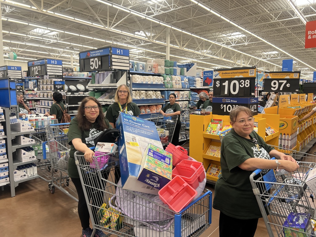 Teachers wait in checkout line at Wal-Mart