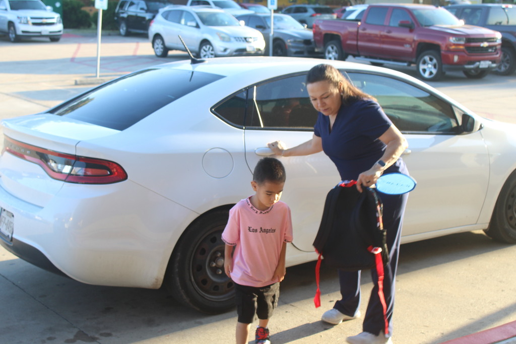 Diana Buendia assists with drop off at Petty