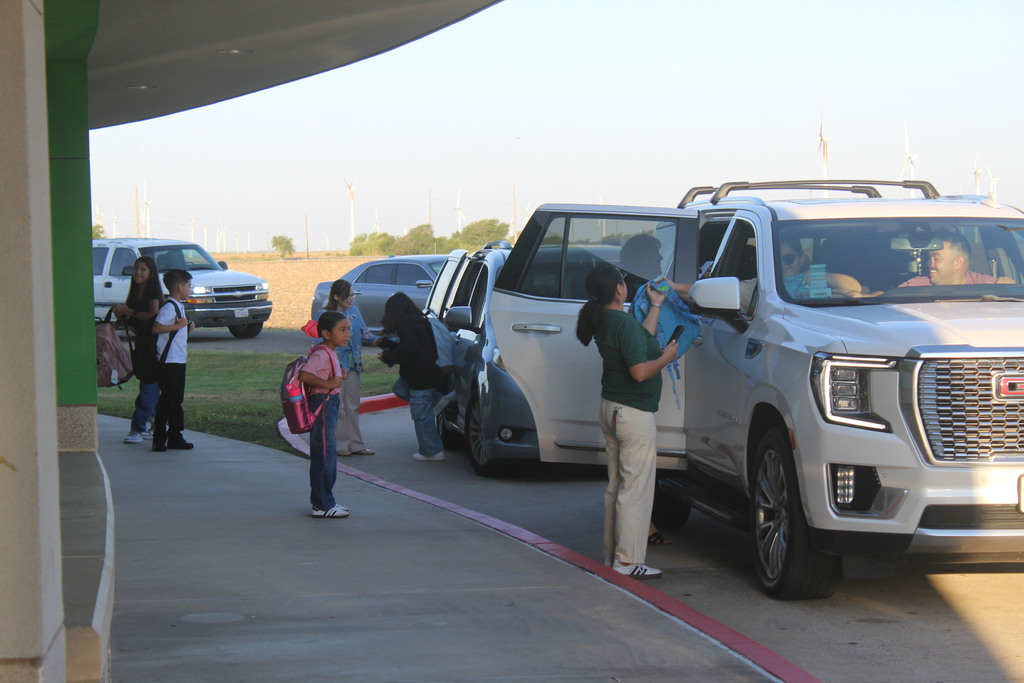 Miranda Benedict helps with drop off at Petty