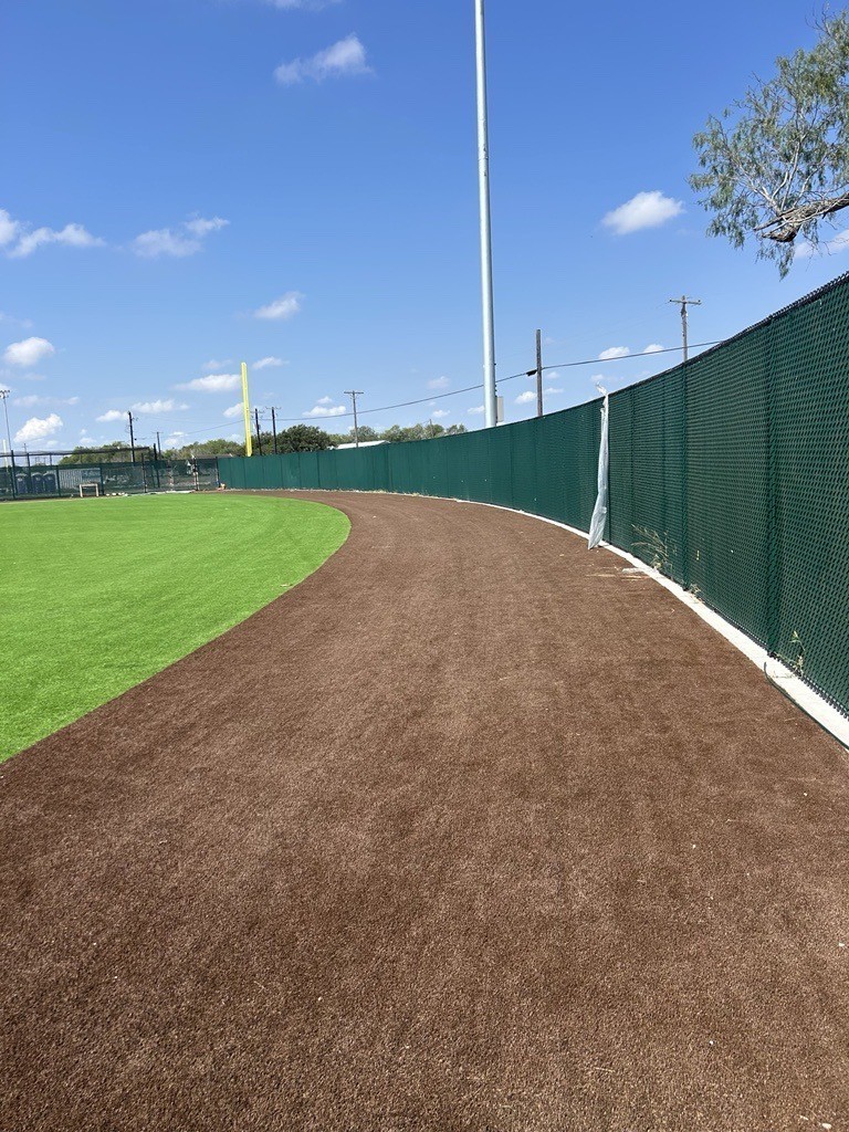 Wind slats in outfield fence