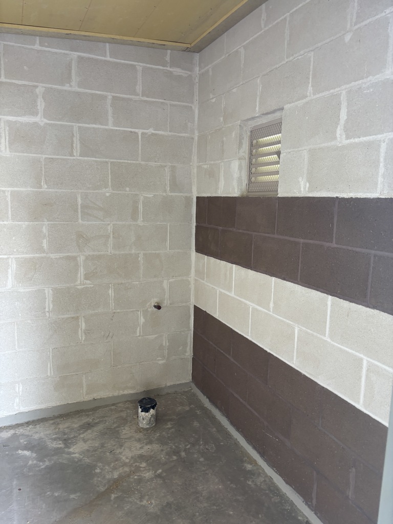 Baseball home dugout restroom plumbing