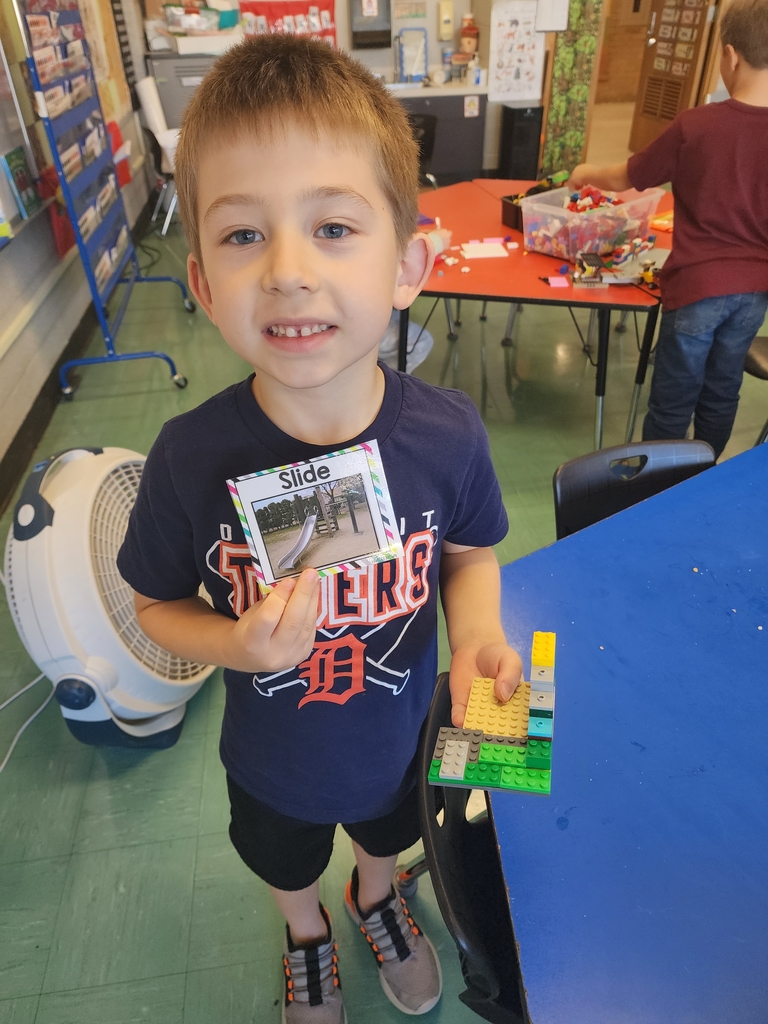 Child holding Legos