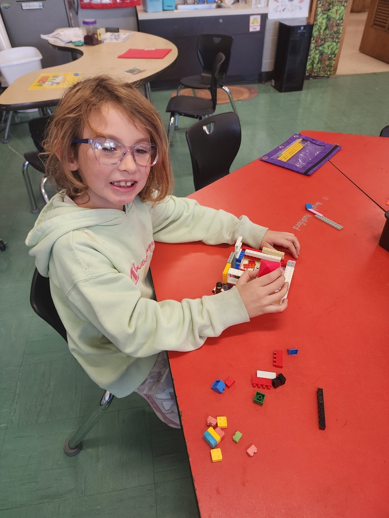 Child holding Legos