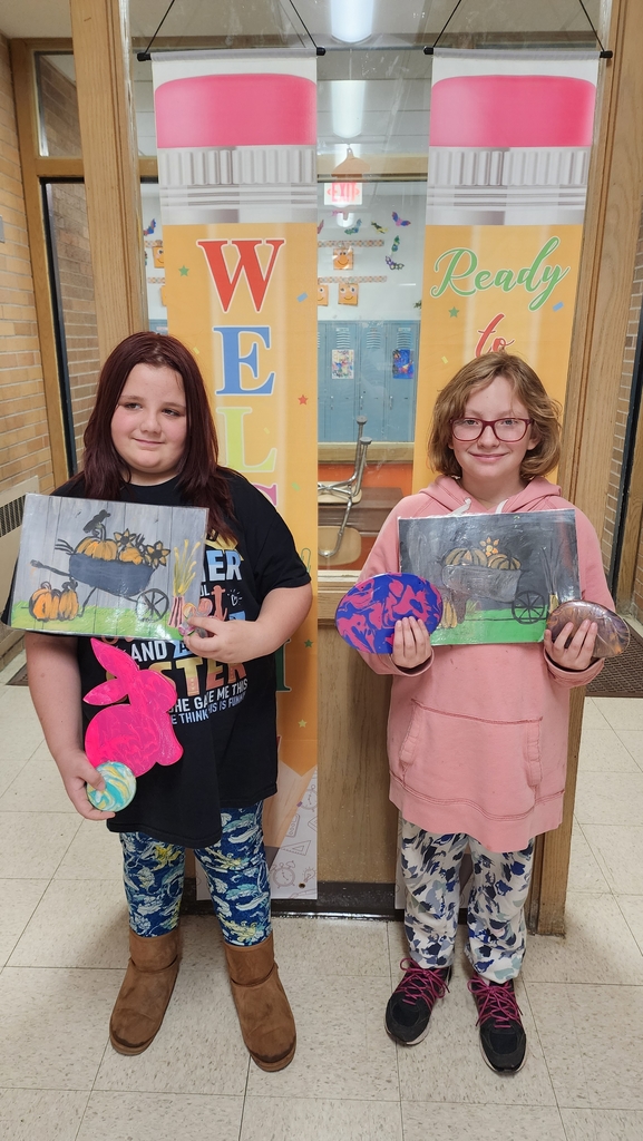 Girls show paintings