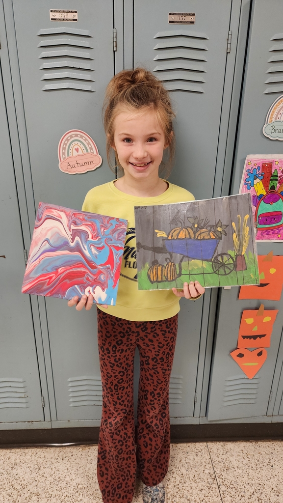 Girl shows paintings 