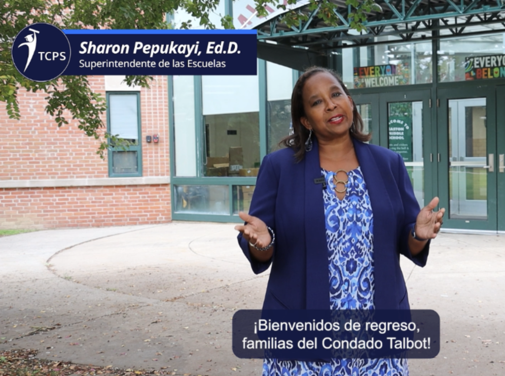 Dr. Pepukayi standing outside Easton Middle recording her "Welcome Back" video for the 2025-2026 school year