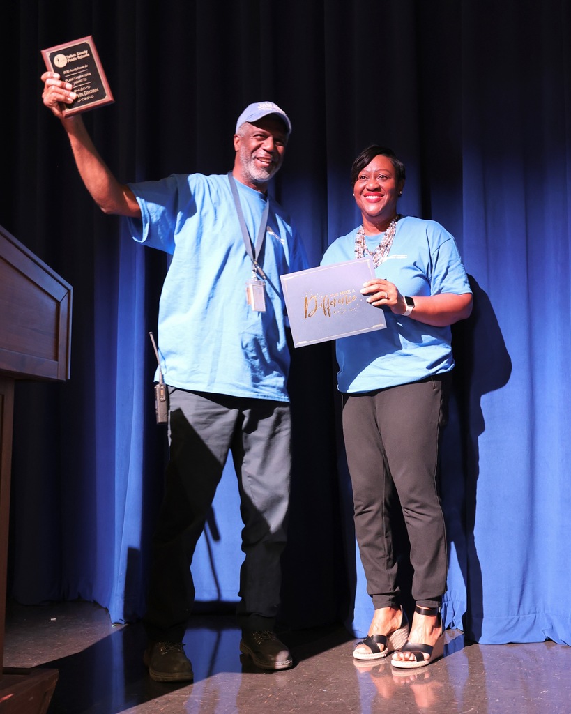 Custodian being honored during opening day