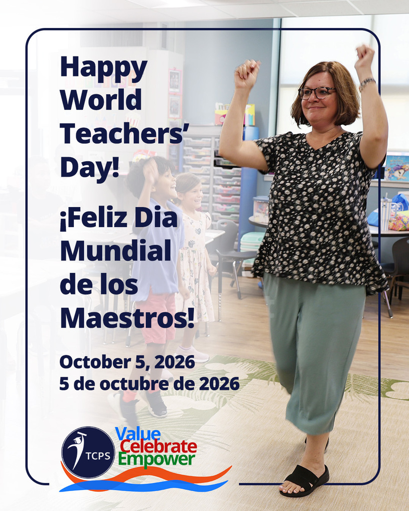A happy, peppy teacher with her arms up and students cheering