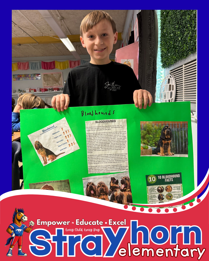 students with posterboard and dog pictures