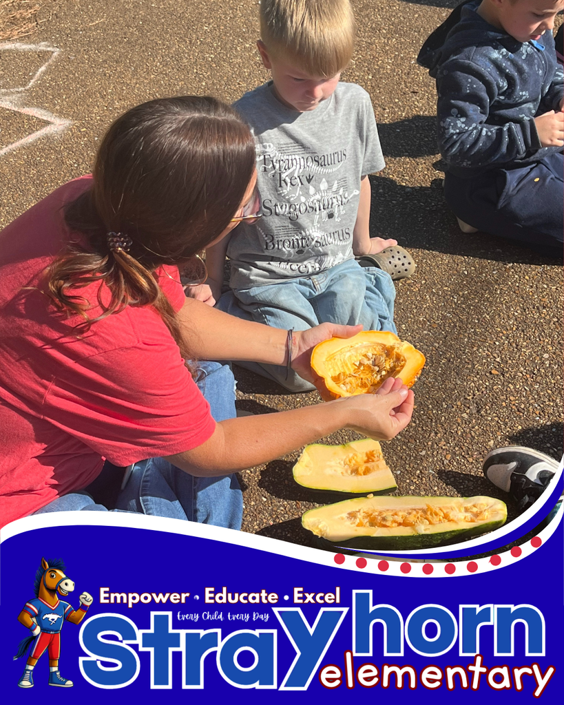 teacher and student with pumpkins and gourds