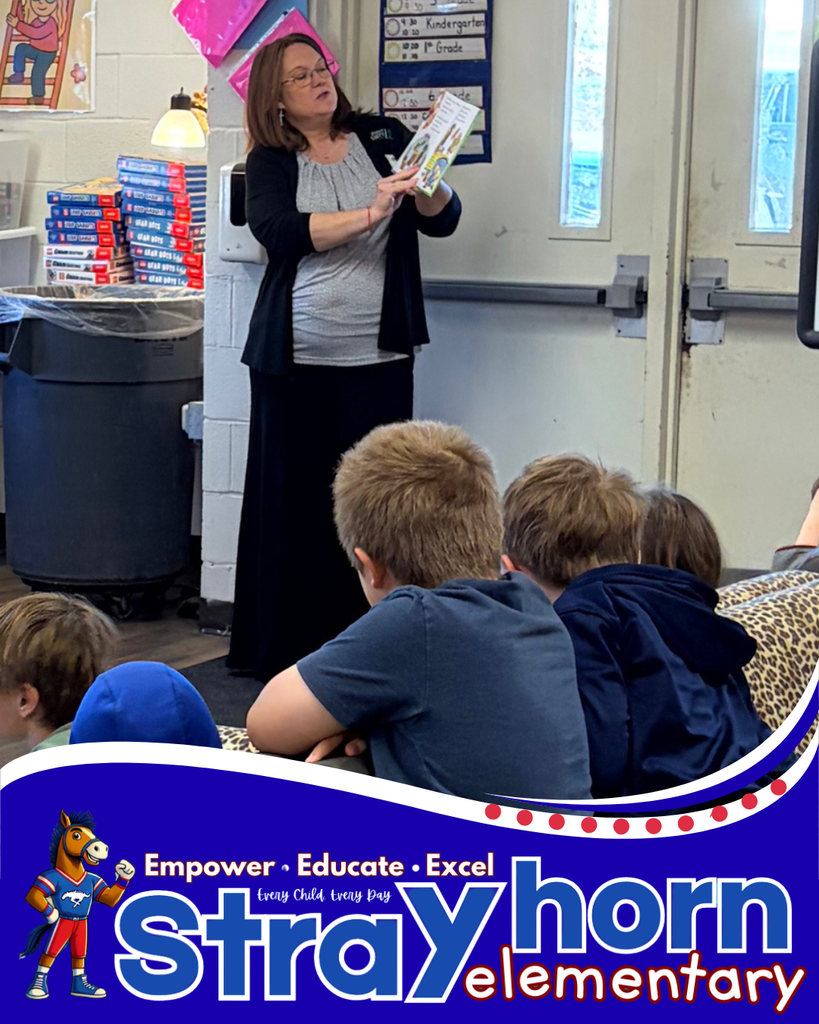 lady with book reading to students