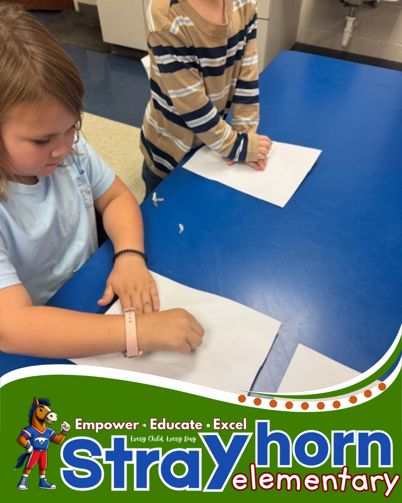 students coloring on paper