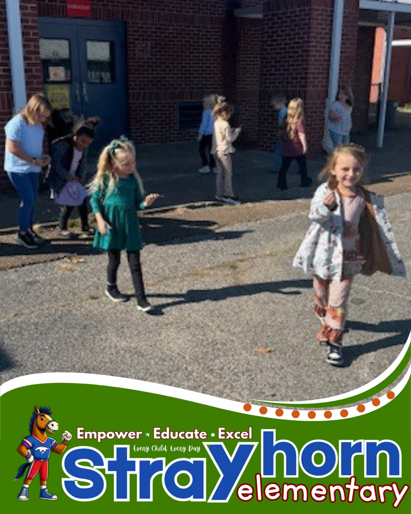 students running around picking up leafs