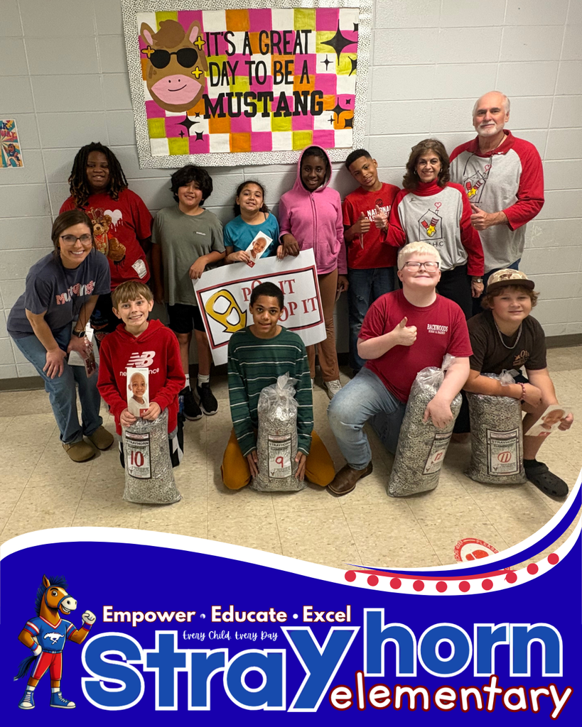 students smiling at camera with bags of tabs