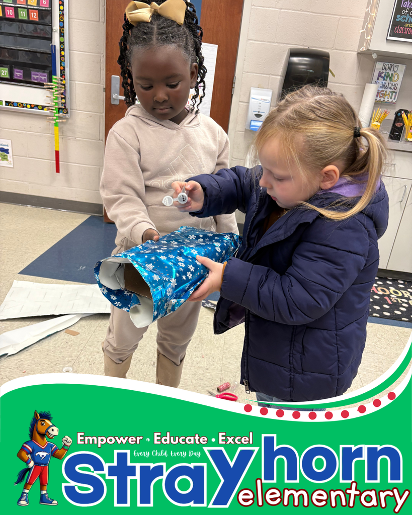 students building with craft materials 