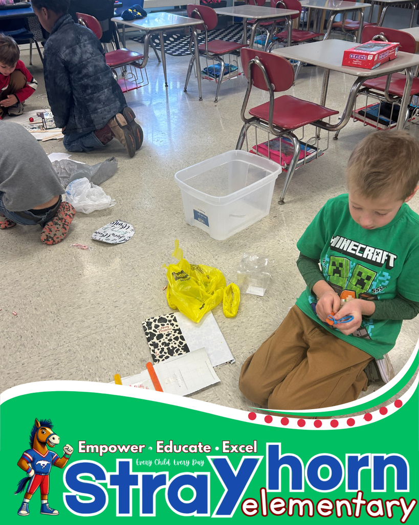 students building with craft materials 