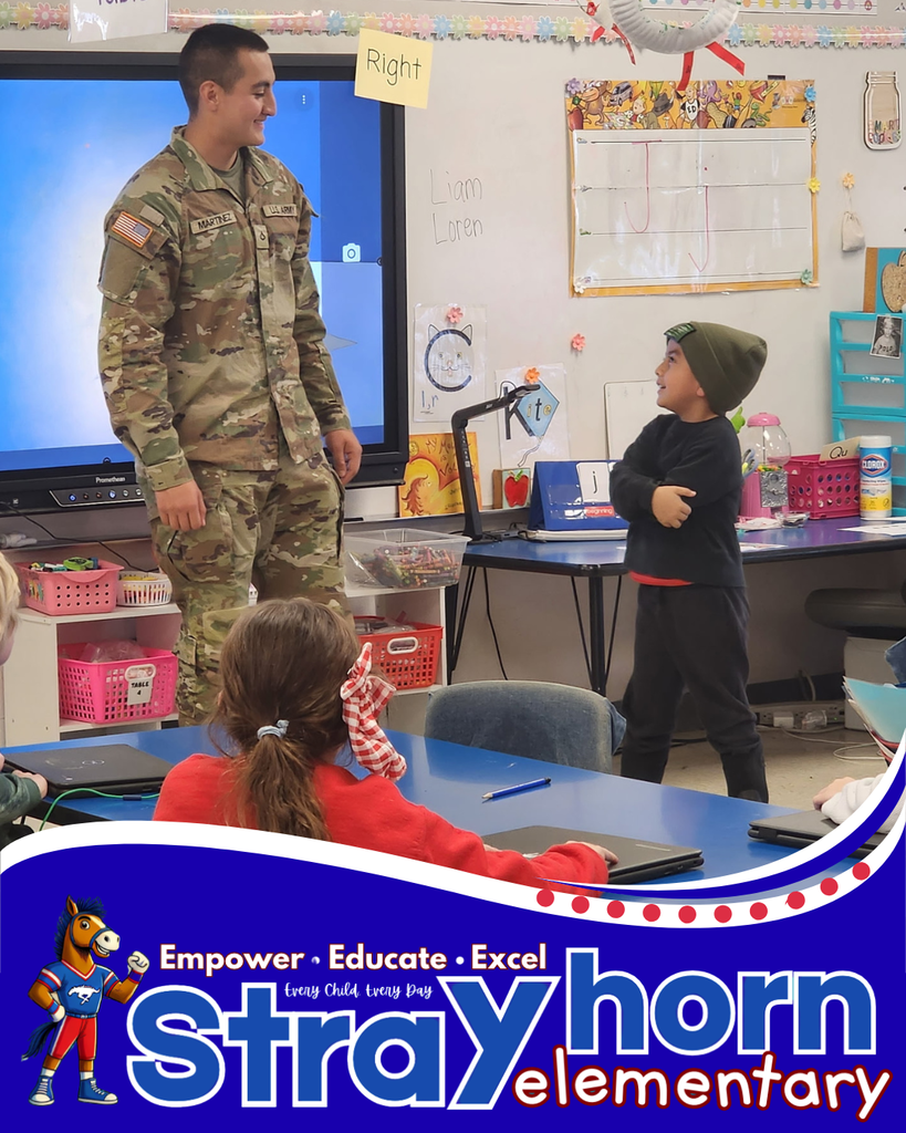Soldier and little boy smiling at each other