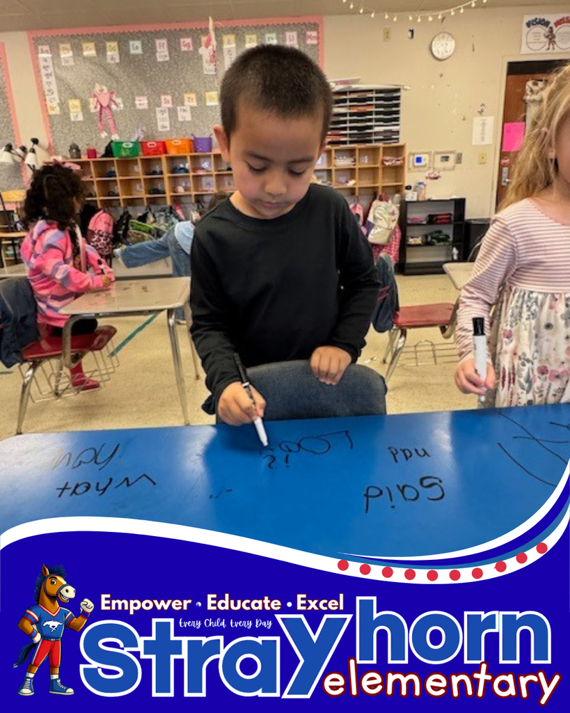student writing on desk