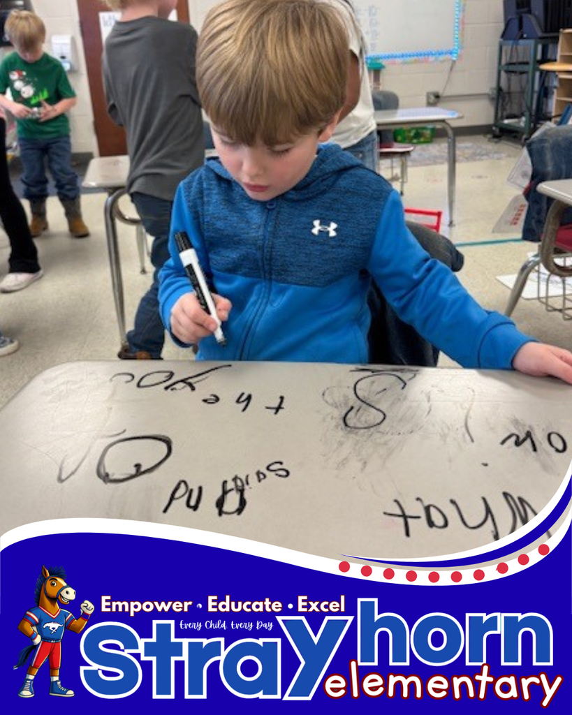 student writing on desk