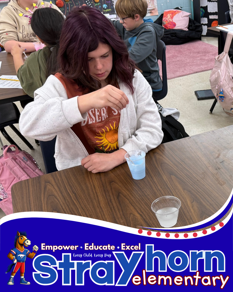 students at table with silly putty
