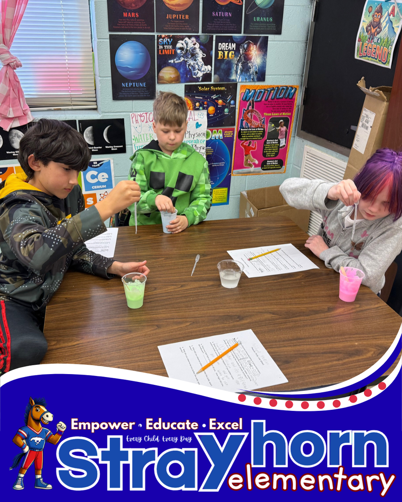 students at table with silly putty